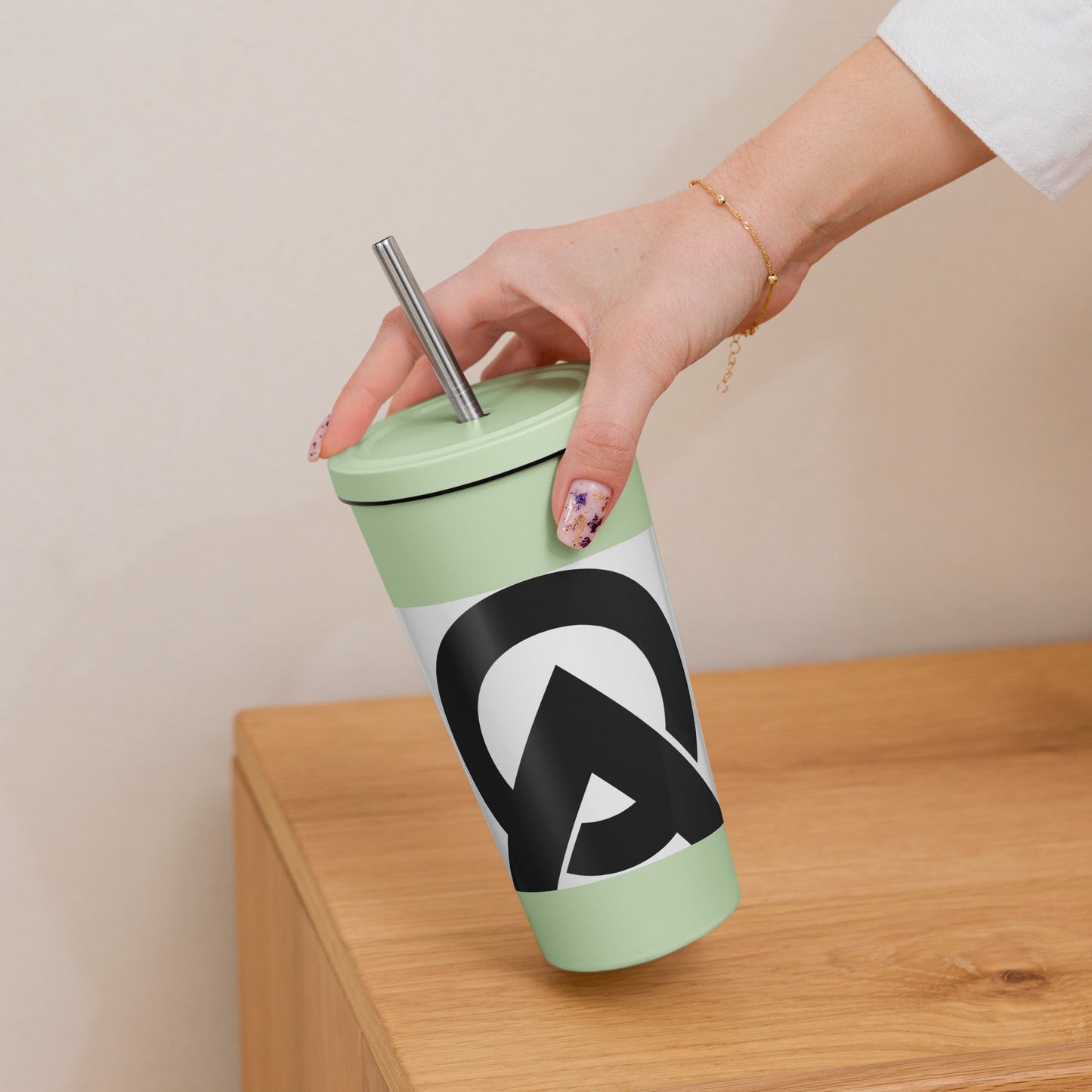 Insulated tumbler with a straw