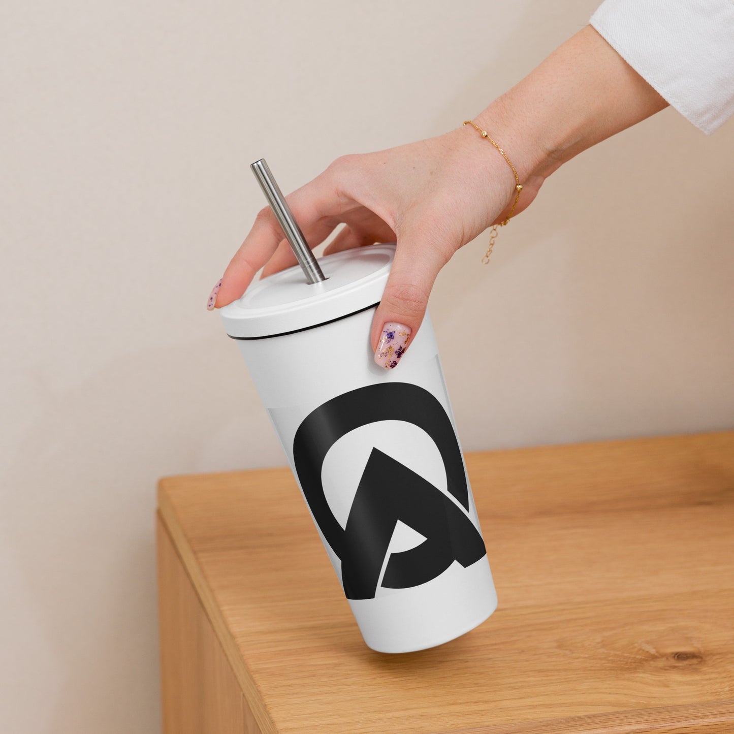 Insulated tumbler with a straw